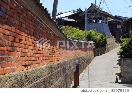 Niigata Sado Kyomachi-dori Red Brick Fence and Toki Bell Tower 82979539