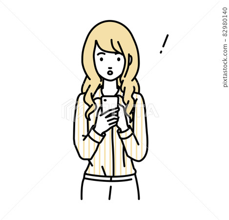 A woman in a blouse who was surprised to notice something while standing and operating a smartphone 82980140