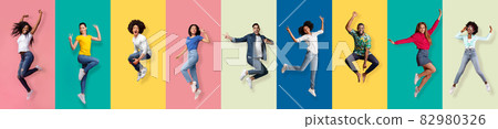Positive emotional smiling diverse fashion guys and ladies hipsters jumping, flying in air have fun, panorama Positive emotional smiling diverse fashion guys and ladies hipsters jumping, flying in air have fun, panorama 82980326