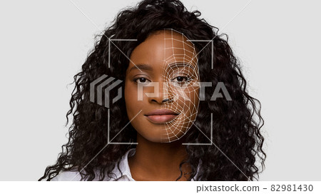 Cheerful cute black lady make identity authentication for personal data protection, double exposure and digital hologram Cheerful cute black lady make identity authentication for personal data protection, double exposure and digital hologram 82981430
