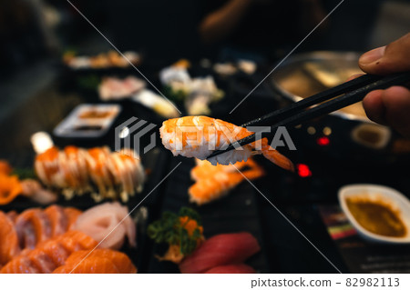 Sashimi and sashimion a plate in a Japanese restaurant 82982113