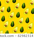 Seamless Pattern of Halves of Ripe Avocado on orange background, Healthy oily food, Keto diet 82982314