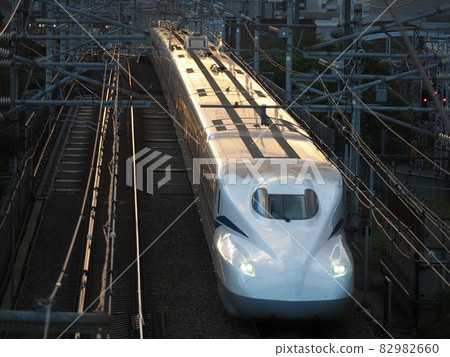 Shinkansen N700S J1 formation at the Honmachi overpass at twilight 82982660