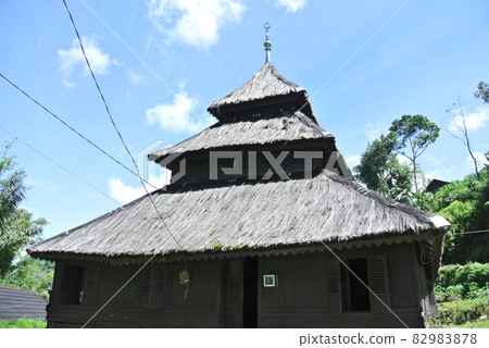 WEST SUMATERA, INDONESIA -JUNE 8, 2014: Tuo Kayu Jao Mosque is located in West Sumatra, Indonesia. Built in 1599 and is the second oldest mosque in Indonesia. WEST SUMATERA, INDONESIA -JUNE 8, 2014: Tuo Kayu Jao Mosque is located in West Sumatra, Indonesia. Built in 1599 and is the second oldest mosque in Indonesia. 82983878
