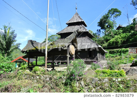 WEST SUMATERA, INDONESIA -JUNE 8, 2014: Tuo Kayu Jao Mosque is located in West Sumatra, Indonesia. Built in 1599 and is the second oldest mosque in Indonesia. WEST SUMATERA, INDONESIA -JUNE 8, 2014: Tuo Kayu Jao Mosque is located in West Sumatra, Indonesia. Built in 1599 and is the second oldest mosque in Indonesia. 82983879