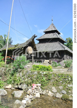 WEST SUMATERA, INDONESIA -JUNE 8, 2014: Tuo Kayu Jao Mosque is located in West Sumatra, Indonesia. Built in 1599 and is the second oldest mosque in Indonesia. WEST SUMATERA, INDONESIA -JUNE 8, 2014: Tuo Kayu Jao Mosque is located in West Sumatra, Indonesia. Built in 1599 and is the second oldest mosque in Indonesia. 82983880