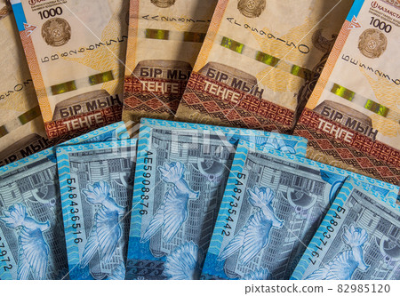 Paper banknotes tenge KZT. Tenge is the national currency of Kazakhstan. bank of Kazakhstan Paper banknotes tenge KZT. Tenge is the national currency of Kazakhstan. bank of Kazakhstan 82985120