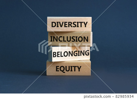 Equity, diversity, inclusion and belonging symbol. Wooden blocks with words 'equity, diversity, inclusion, belonging' on beautiful grey background. Diversity, equity, inclusion and belonging concept. Equity, diversity, inclusion and belonging symbol. Wooden blocks with words 'equity, diversity, inclusion, belonging' on beautiful grey background. Diversity, equity, inclusion and belonging concept. 82985934