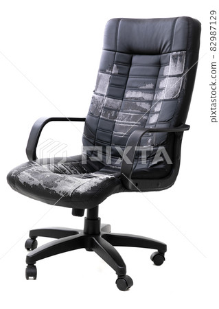 shabby leather office chair on isolated background 82987129