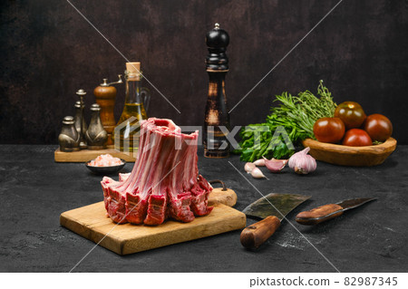 Raw lamb ribs rolled in the shape of crown 82987345