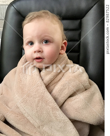 Beautiful baby boy with child face posing photographer 82987522