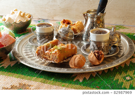 Turkish Coffee served with Turkish Delight on metal tray 82987969