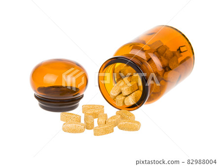 Full vintage apothecary bottle with pills and open lid Full vintage apothecary bottle with pills and open lid 82988004