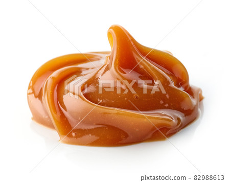 melted caramel on white background 82988613