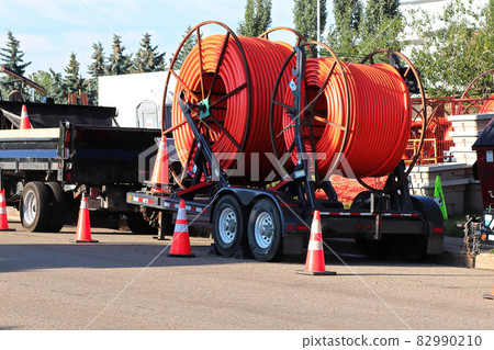 Plastic tube pipe for laying underground cables coiled 82990210