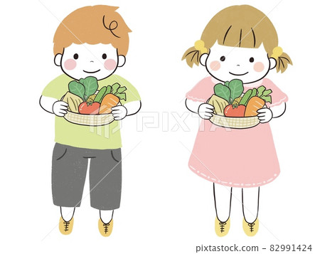 Boys and girls harvesting a basket full of fresh vegetables in the vegetable garden 82991424