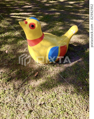 A landscape of colorful bird playgrounds in a children's park in the sunlight through the trees, Ibaraki City, Osaka Prefecture A landscape of colorful bird playgrounds in a children's park in the sunlight through the trees, Ibaraki City, Osaka Prefecture 82992902