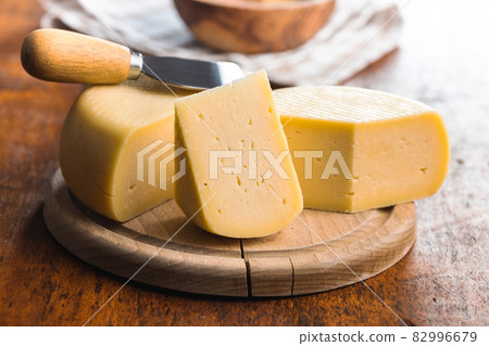 Block of hard cheese. Block of hard cheese. 82996679