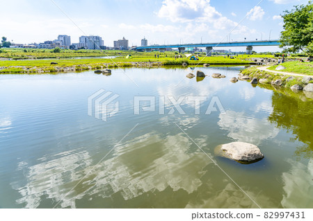 Tokyo] Tama River and Shin Futago Bridge seen... - Stock Photo