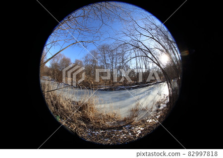Frozen river in forest. Circular fisheye landscape 82997818