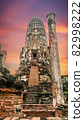 Ruins of the ancient pagoda on colorful background, Scenic view of Thai historical pagoda at dusk, Low angle view of ancient pagoda at historical site, Landscape view of Thai cultural architecture 82998222