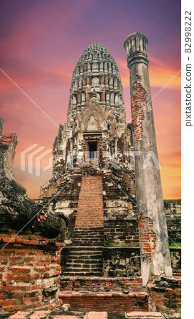 Ruins of the ancient pagoda on colorful background, Scenic view of Thai historical pagoda at dusk, Low angle view of ancient pagoda at historical site, Landscape view of Thai cultural architecture Ruins of the ancient pagoda on colorful background, Scenic view of Thai historical pagoda at dusk, Low angle view of ancient pagoda at historical site, Landscape view of Thai cultural architecture 82998222