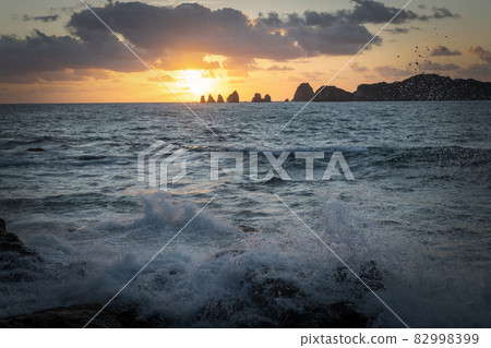Nichinan City Izakibana Park Campsite The rising sun and the splashing waves from the lower rocks to the seven rocks of Hyuga Nada Nichinan City Izakibana Park Campsite The rising sun and the splashing waves from the lower rocks to the seven rocks of Hyuga Nada 82998399