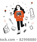 Young pretty student holding books walking down the street 82998880