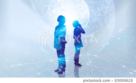 Electronic silhouette image of a woman standing in a white background and global cyber image space Electronic silhouette image of a woman standing in a white background and global cyber image space 83000628