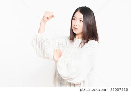 Housewife angry and raising her fist 83007316