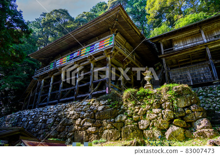 Temple architecture built on the steep slopes of deep forest Temple architecture built on the steep slopes of deep forest 83007473