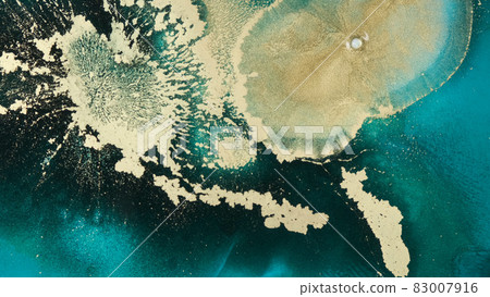 Gold green ink in motion background. Luxurious background of gold glitter, green liquid paint in motion. Abstract emerald textures dynamically blended, close-up. Liquid explosion backdrop 83007916