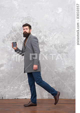 trendy man with beard. Brutal bearded hipster in denim trendy man with beard. Brutal bearded hipster in denim 83010357