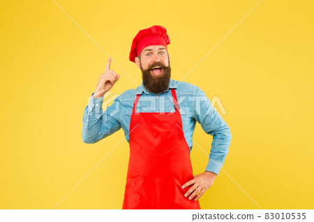 Cook bearded man knows some secret tips cooking elicious meals, good idea 83010535