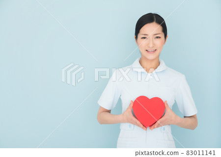 Female nurse with a heart symbol 83011141