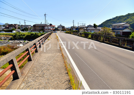 Kamikawa Bridge (Fumiiri Oya Line) / View toward Oya from Kamikawa (Ueda City, Nagano Prefecture) [2021.10] 83011191