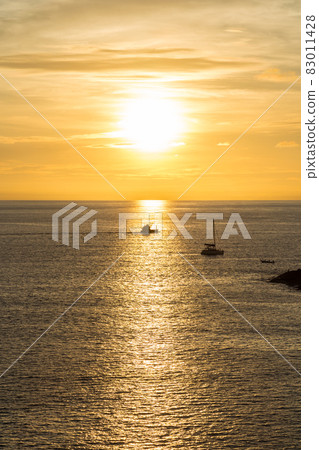 Silhouette yacht. Boat on the andaman sea at sunset in Phuket, Thailand Silhouette yacht. Boat on the andaman sea at sunset in Phuket, Thailand 83011428