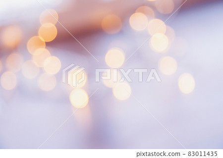 many blurred small electric bulbs on a wall. Yellow blurred lights. Wall of Christmas lights many blurred small electric bulbs on a wall. Yellow blurred lights. Wall of Christmas lights 83011435