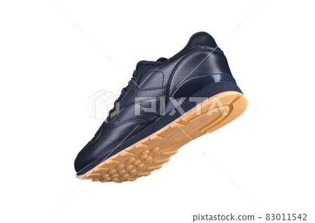 Sport shoes. Black sneaker on a white background. Shoe. 83011542