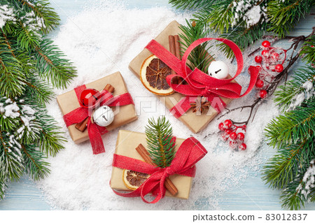 Christmas gift boxes with craft decor 83012837