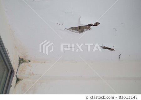 Crack cement ceiling wall from water, moist, humidity home renovation construction concept 83013145