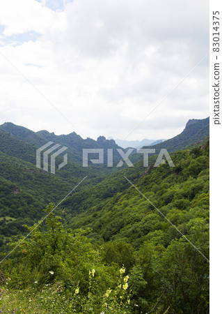 The Caucasus Mountains. Mountain peaks in summer. 83014375