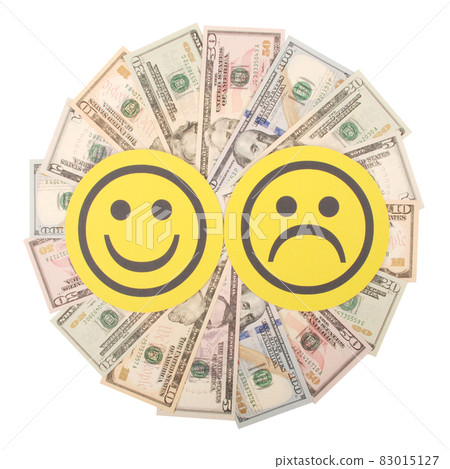 Yellow smiley and sad smiley faces on mandala kaleidoscope from money. Yellow smiley and sad smiley faces on mandala kaleidoscope from money. 83015127