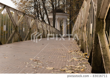 Bridge park colorful beautiful nature, autumn green forest woods path, golden. Road environment metal, alley vibrant Bridge park colorful beautiful nature, autumn green forest woods path, golden. Road environment metal, alley vibrant 83016711