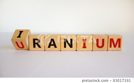 Uranium enrichment in Iran symbol. Turned cubes with words 'Iran, uranium'. Beautiful white background, copy space. Business, nuclear technology and uranium enrichment in Iran concept. Uranium enrichment in Iran symbol. Turned cubes with words 'Iran, uranium'. Beautiful white background, copy space. Business, nuclear technology and uranium enrichment in Iran concept. 83017191