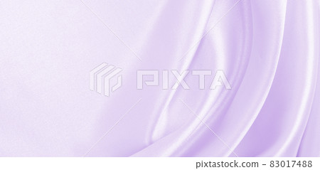 Smooth elegant lilac silk or satin texture as wedding background. Luxurious background design Smooth elegant lilac silk or satin texture as wedding background. Luxurious background design 83017488