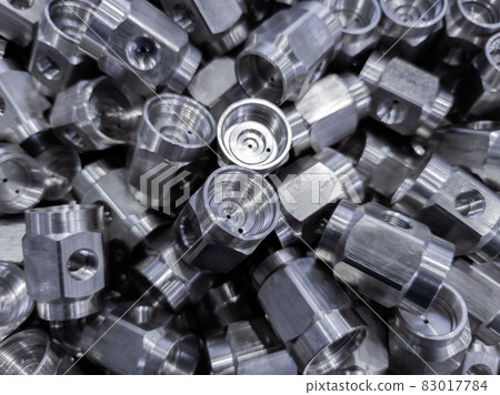 pile of abstract industrial close-up full frame background of shiny steel turned hexagonal parts pile of abstract industrial close-up full frame background of shiny steel turned hexagonal parts 83017784