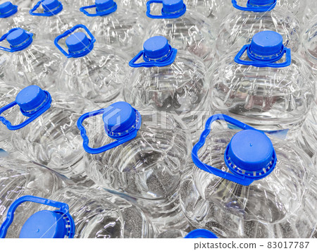 full frame background of transparent plastic 5 liter bottles of clear water full frame background of transparent plastic 5 liter bottles of clear water 83017787