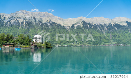 Schloss Seeburg, Seeburg castle, in Iseltwald with lake Brienz. Schloss Seeburg, Seeburg castle, in Iseltwald with lake Brienz. 83017924
