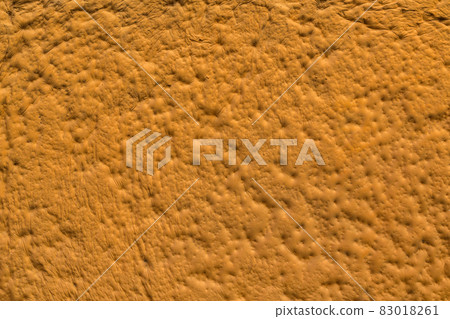orange plaster with decorative indentation finish wall texture and background orange plaster with decorative indentation finish wall texture and background 83018261